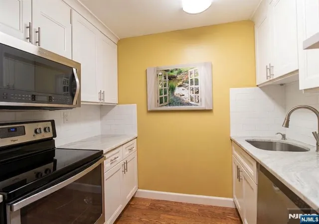 Photo 3 of Condo for sale at 1033 Harmon Cove Tower, Secaucus, NJ 07094 | MLS# 26023261 | Listing updated on 2026-09-16