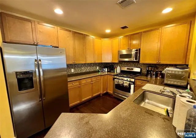 Photo 2 of Condo for sale at 54 Polifly Rd #108, Hackensack, NJ 07601 | MLS# 26026321 | Listing updated on 2026-09-10