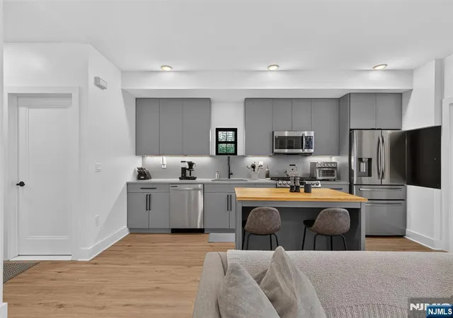 Photo 3 of Condo for sale at 56 Reservoir Ave #1, Jersey City, NJ 07307 | MLS# 26027217 | Listing updated on 2026-09-08