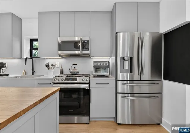 Photo 4 of Condo for sale at 56 Reservoir Ave #1, Jersey City, NJ 07307 | MLS# 26027217 | Listing updated on 2026-09-08