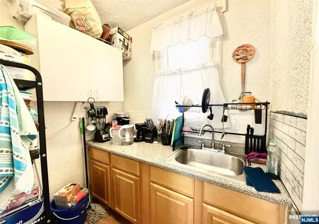 Photo 4 of Multi family home for sale at 37 Krueger Pl, Passaic, NJ 07055 | MLS# 26027967 | Listing updated on 2026-09-07