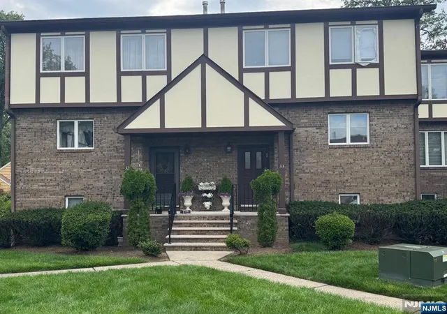 Photo 1 of Townhouse for sale at 33 Canterbury Ln, New Milford, NJ 07646 | MLS# 26029045 | Listing updated on 2026-09-06
