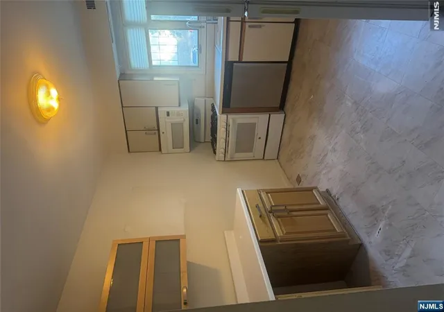 Photo 3 of Townhouse for sale at 33 Canterbury Ln, New Milford, NJ 07646 | MLS# 26029045 | Listing updated on 2026-09-06