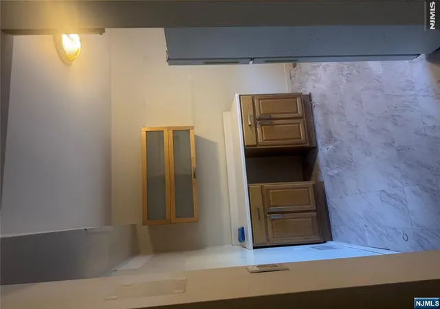 Photo 3 of Townhouse for sale at 33 Canterbury Ln, New Milford, NJ 07646 | MLS# 26029045 | Listing updated on 2026-09-06