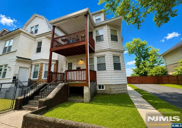 Photo 1 of Multi family home for sale at 554 Norwood St, East Orange, NJ 07018 | MLS# 26029208 | Listing updated on 2026-10-13