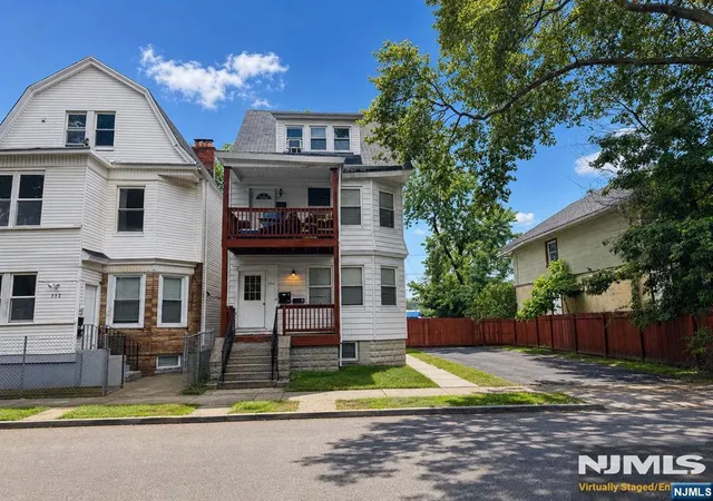 Photo 2 of Multi family home for sale at 554 Norwood St, East Orange, NJ 07018 | MLS# 26029208 | Listing updated on 2026-10-13