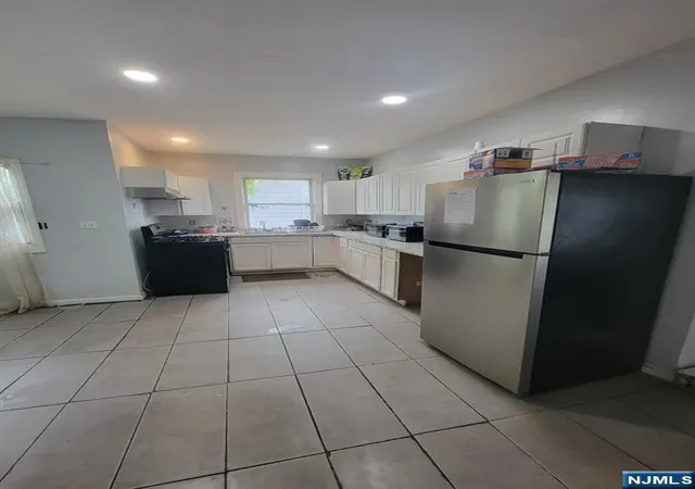 Photo 4 of Single family home for sale at 476 Laurel St, Orange, NJ 07050 | MLS# 26030279 | Listing updated on 2026-10-13