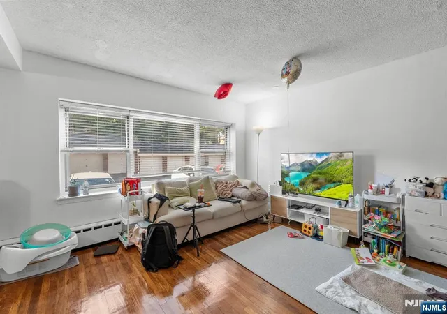 Photo 2 of Condo for sale at 1575 Center Ave #1F, Fort Lee, NJ 07024 | MLS# 26030387 | Listing updated on 2026-09-08