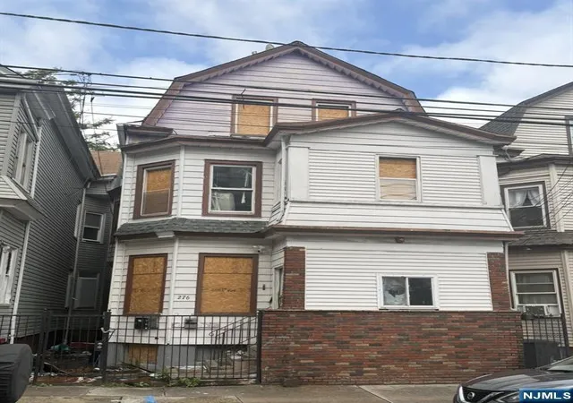 Multi family home for sale at 276 Carroll St, Paterson, NJ 07501 | MLS# 26030541