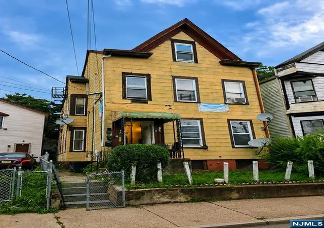 Multi family home for sale at 165 Pearl St, Paterson, NJ 07501 | MLS# 26030581
