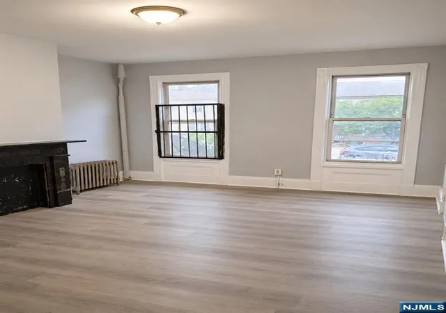 Photo 2 of Multi family home for sale at 165 Pearl St, Paterson, NJ 07501 | MLS# 26030581 | Listing updated on 2026-09-07
