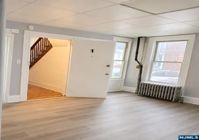 Photo 4 of Multi family home for sale at 165 Pearl St, Paterson, NJ 07501 | MLS# 26030581 | Listing updated on 2026-09-07