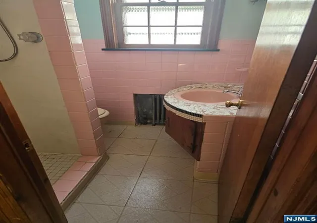 Photo 3 of Multi family home for sale at 153 High St, West Orange, NJ 07052 | MLS# 26030869 | Listing updated on 2026-10-13