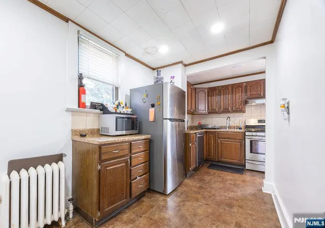 Photo 3 of Single family home for sale at 420 Dewitt Ave, Belleville, NJ 07109 | MLS# 26031059 | Listing updated on 2026-09-04