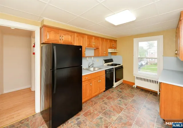 Photo 4 of Multi family home for sale at 176 E Main St, Bergenfield, NJ 07621 | MLS# 26031209 | Listing updated on 2026-09-02