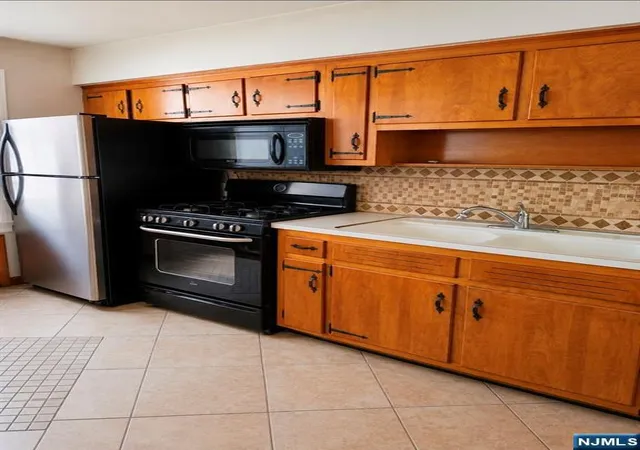 Photo 2 of Multi family home for sale at 106 Chestnut St, Garfield, NJ 07026 | MLS# 26031350 | Listing updated on 2026-09-07
