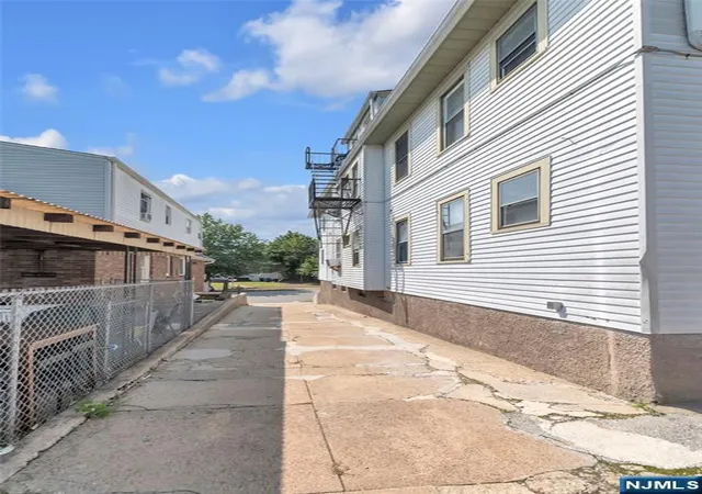 Photo 2 of Multi family home for sale at 135 23rd Avenue, Paterson, NJ 07513 | MLS# 26032527 | Listing updated on 2026-09-15