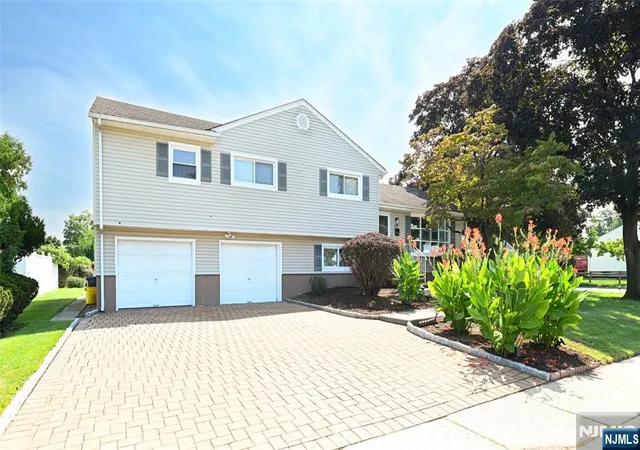 Photo 2 of Single family home for sale at 145 Sutton Pl, New Milford, NJ 07646 | MLS# 26032737 | Listing updated on 2026-09-08