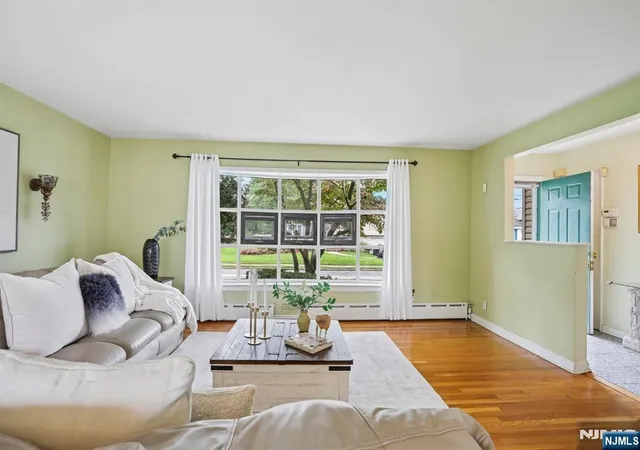 Photo 3 of Single family home for sale at 145 Sutton Pl, New Milford, NJ 07646 | MLS# 26032737 | Listing updated on 2026-09-08