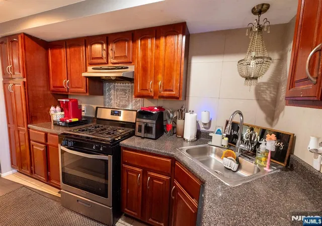 Photo 3 of Townhouse for sale at 233 12 Nesbit Ter, Irvington, NJ 07111 | MLS# 26032972 | Listing updated on 2026-09-05
