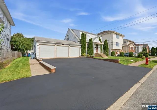 Photo 2 of Multi family home for sale at 120 Campbell Ave, Clifton, NJ 07013 | MLS# 26033083 | Listing updated on 2026-09-09