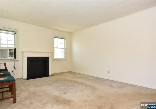Photo 3 of Single family home for sale at 12 Woodside Ave, Hawthorne, NJ 07506 | MLS# 26033196 | Listing updated on 2026-09-17