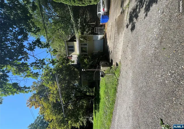 Photo 2 of Single family home for sale at 15 Brook Rd, West Milford, NJ 07421 | MLS# 26033540 | Listing updated on 2026-10-13