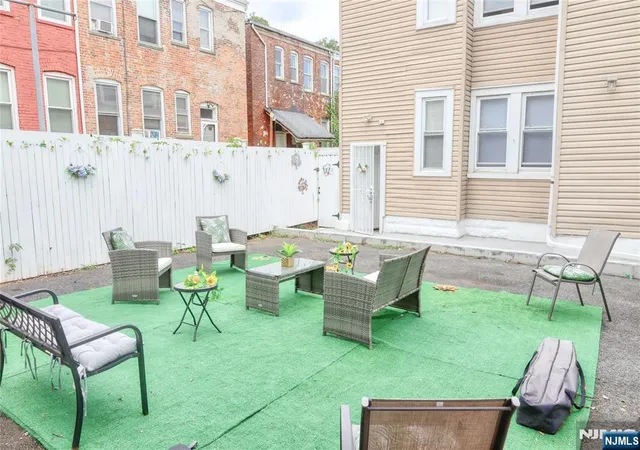 Photo 3 of Multi family home for sale at 9 Emerson Pl, Newark, NJ 07114 | MLS# 26033576 | Listing updated on 2026-09-19