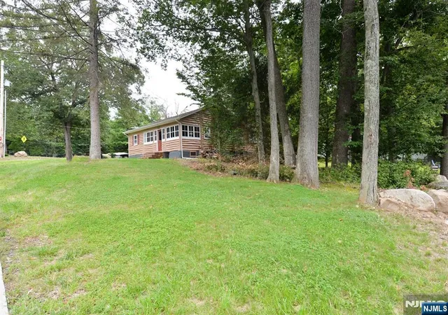 Photo 3 of Single family home for sale at 100 Tower Rd, Wayne, NJ 07470 | MLS# 26033603 | Listing updated on 2026-09-04