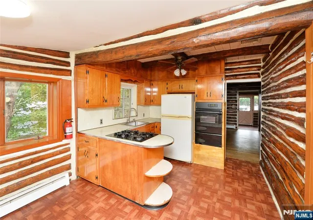 Photo 4 of Single family home for sale at 100 Tower Rd, Wayne, NJ 07470 | MLS# 26033603 | Listing updated on 2026-09-04