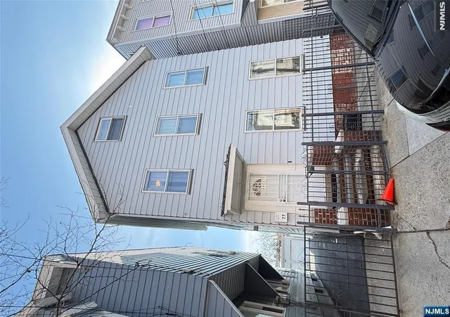 Photo 1 of Multi family home for sale at 77 Stone St, Newark, NJ 07104 | MLS# 26033762 | Listing updated on 2026-09-14