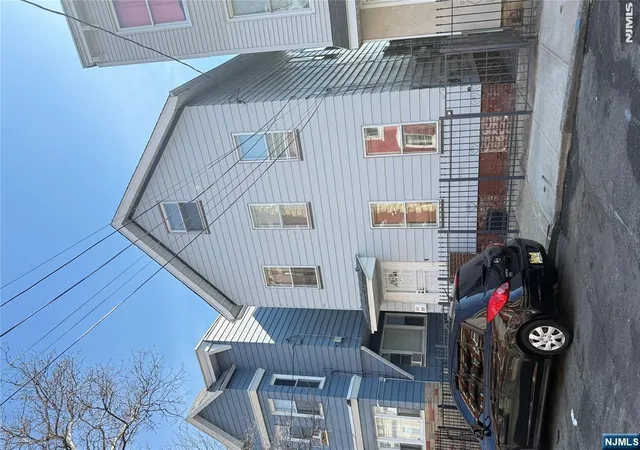 Photo 2 of Multi family home for sale at 77 Stone St, Newark, NJ 07104 | MLS# 26033762 | Listing updated on 2026-09-14