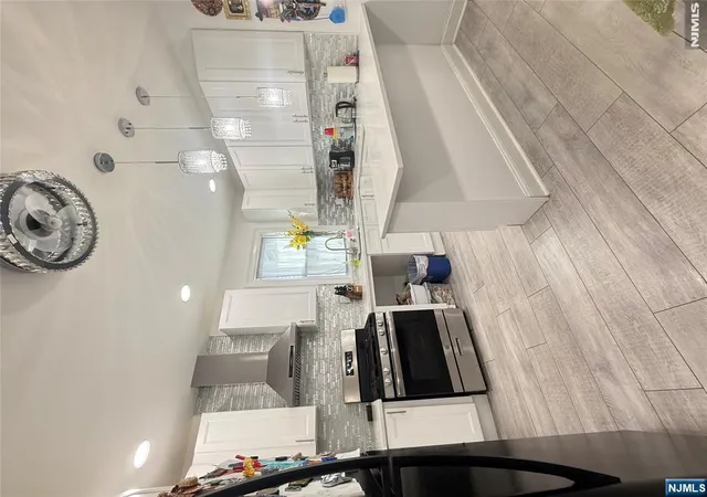Photo 3 of Multi family home for sale at 77 Stone St, Newark, NJ 07104 | MLS# 26033762 | Listing updated on 2026-09-14