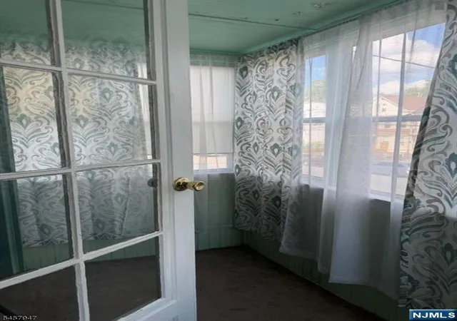 Photo 3 of Multi family home for sale at 580 Madison Ave, Paterson, NJ 07514 | MLS# 26033875 | Listing updated on 2026-09-09