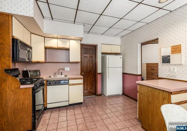 Photo 4 of Multi family home for sale at 341 Grove St, East Rutherford, NJ 07073 | MLS# 26033889 | Listing updated on 2026-10-13