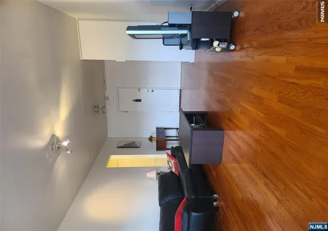 Listing Photo 1 - Condo for sale in building located at 2200 Ctr Ave, Fort Lee, NJ 07024 - Unit #E6