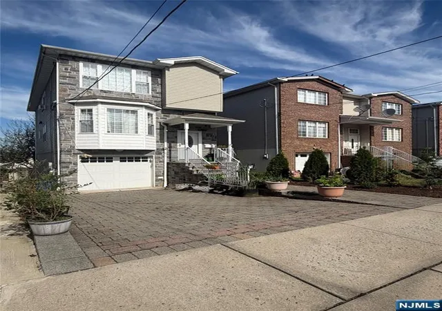 Photo 2 of Single family home for sale at 109 Macarthur Ave, Garfield, NJ 07026 | MLS# 26034019 | Listing updated on 2026-09-12