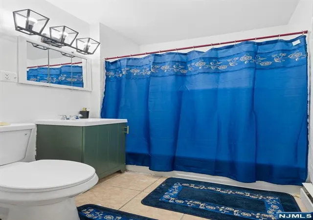 Photo 4 of Single family home for sale at 201 Center St, Orange, NJ 07050 | MLS# 26034099 | Listing updated on 2026-09-25