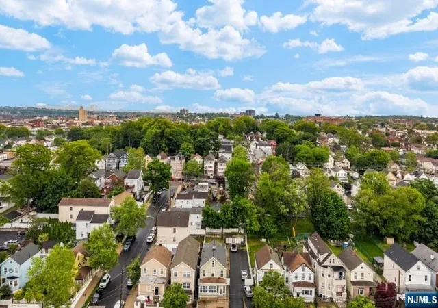 Photo 2 of Multi family home for sale at 171 Burgess Pl, Passaic, NJ 07055 | MLS# 26034369 | Listing updated on 2026-09-13