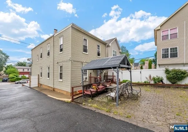 Photo 3 of Multi family home for sale at 171 Burgess Pl, Passaic, NJ 07055 | MLS# 26034369 | Listing updated on 2026-09-13