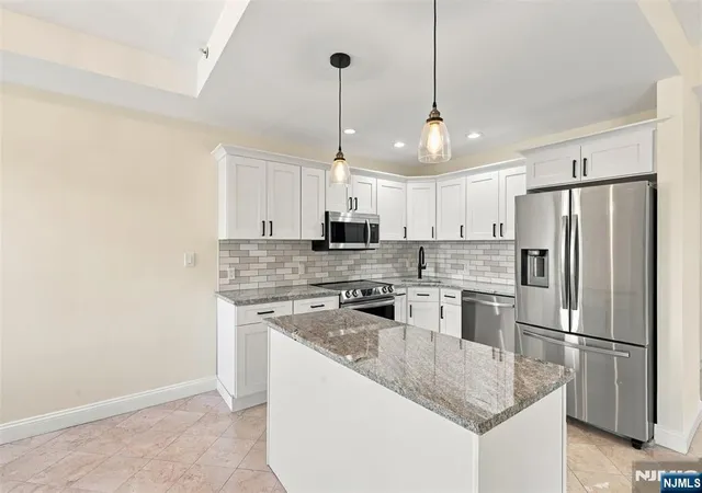 Listing Photo 1 - Condo for sale in building located at 399 11Th St, Palisades Park, NJ 07650 - Unit #206