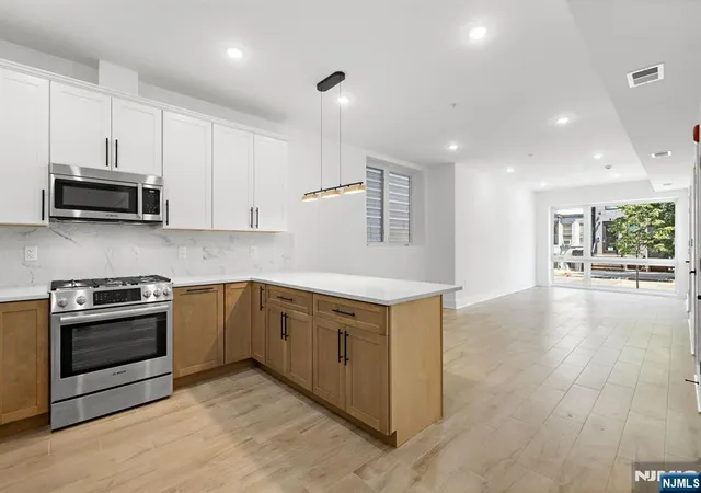 Photo 3 of Condo for sale at 1001 Summit Ave #1, Jersey City, NJ 07307 | MLS# 26035423 | Listing updated on 2026-09-17
