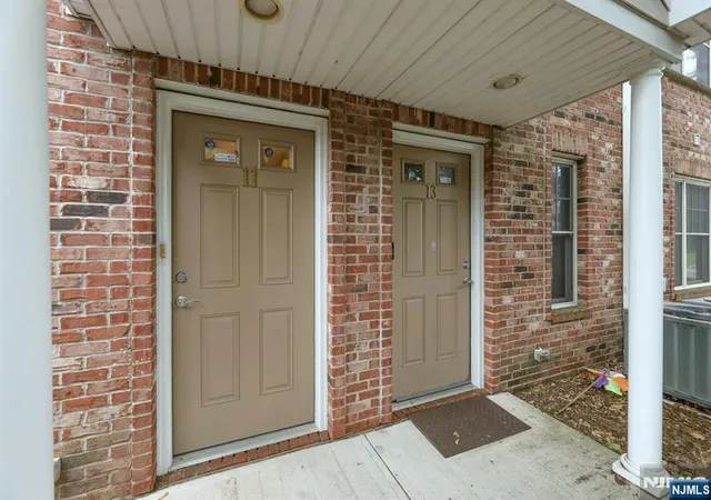 Listing Photo 1 - Condo for sale in building located at 10th Ter Ave, Hasbrouck Heights, NJ 07604 - Unit #11