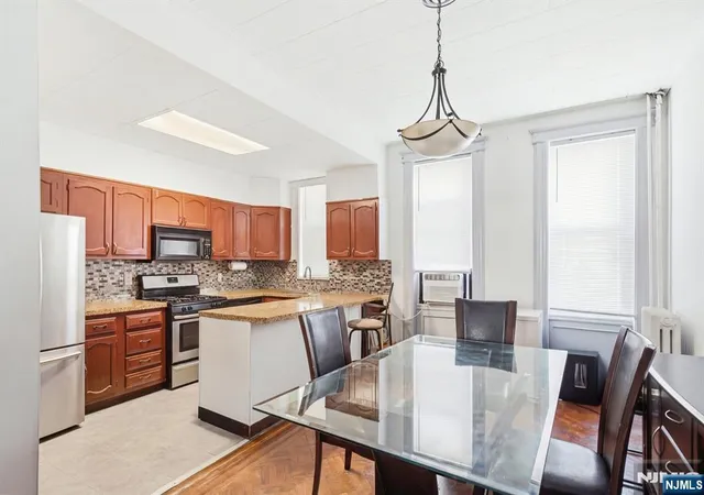 Photo 3 of Single family home for sale at 43 Webster Ave, Jersey City, NJ 07307 | MLS# 26036790 | Listing updated on 2026-10-16
