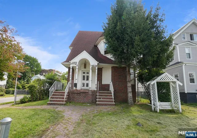 Photo 1 of Single family home for sale at 102 Clinton St, East Orange, NJ 07018 | MLS# 26036870 | Listing updated on 2026-10-13
