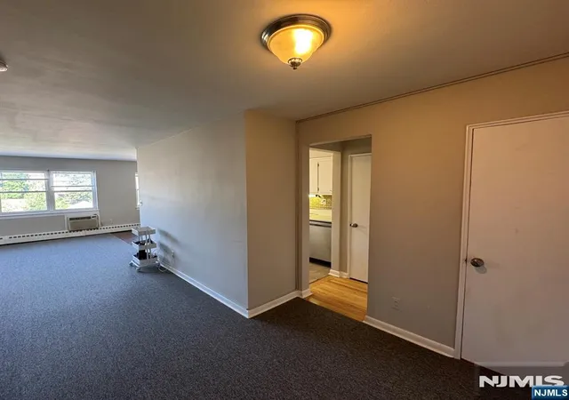 Listing Photo 1 - Condo for sale in building located at 2200 Ctr Ave, Fort Lee, NJ 07024 - Unit #E7
