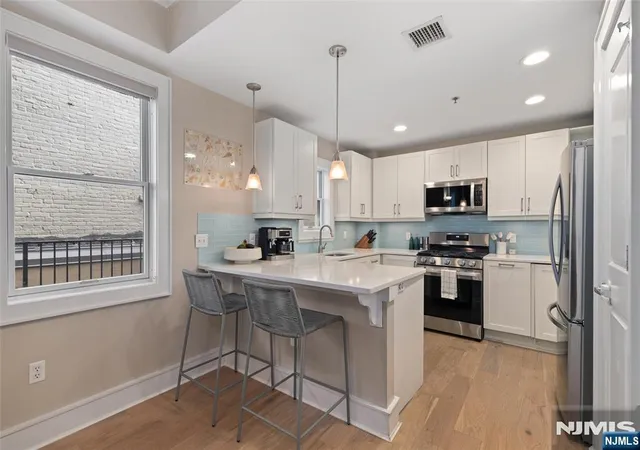 Listing Photo 1 - Condo for sale in building located at 2 Paterson Ave, Hoboken, NJ 07030 - Unit #2B