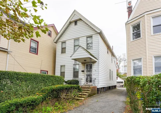 Photo 1 of Single family home for sale at 233 Park St, East Orange, NJ 07017 | MLS# 26037219 | Listing updated on 2026-10-17