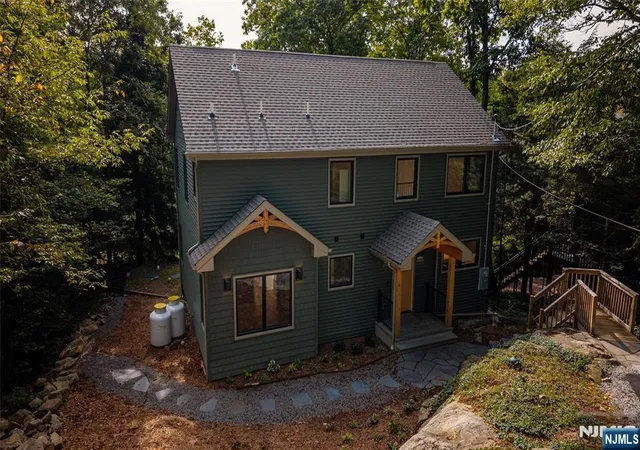 Photo 2 of Single family home for sale at 310 Lakeshore Dr, Vernon, NJ 07422 | MLS# 26037221 | Listing updated on 2026-10-13