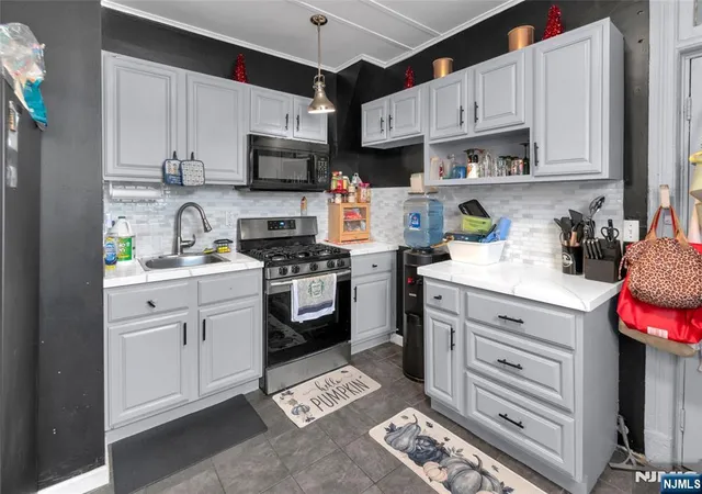 Photo 1 of Townhouse for sale at 240 N 19th Street, East Orange, NJ 07017 | MLS# 26037921 | Listing updated on 2026-10-06